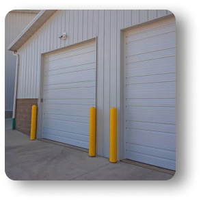 white metal commercial garage doors closed
